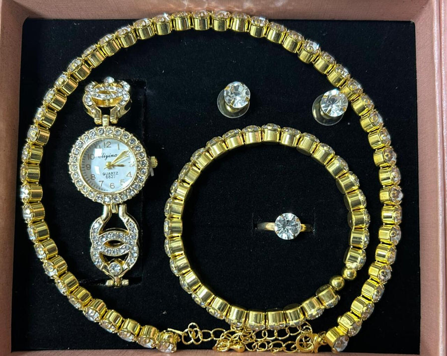 Conjunto de joyas dorado con reloj