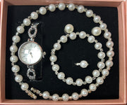 Conjunto de joyas plateado con perlas