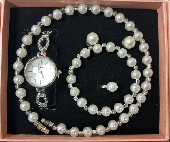 Conjunto de joyas plateado con perlas