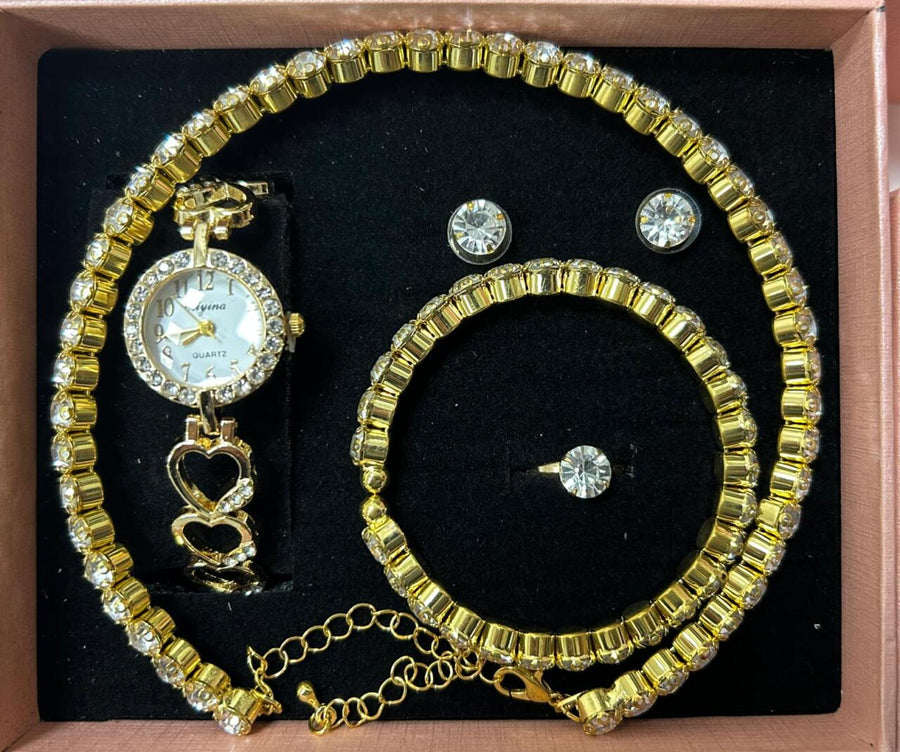 Conjunto de joyas dorado con reloj