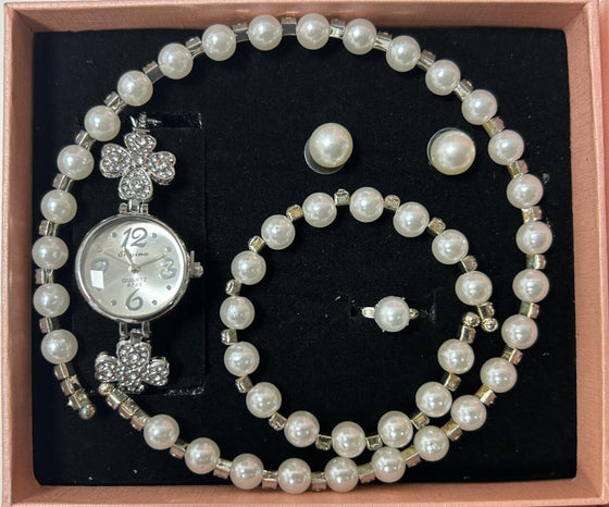 Conjunto de joyas plateado con perlas