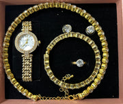 Conjunto de joyas dorado con reloj