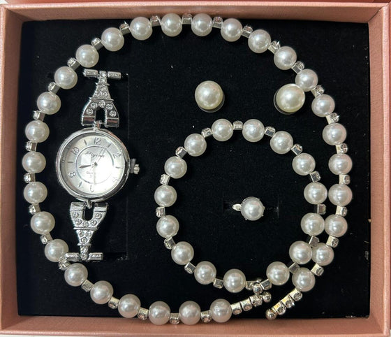 Conjunto de joyas plateado con perlas