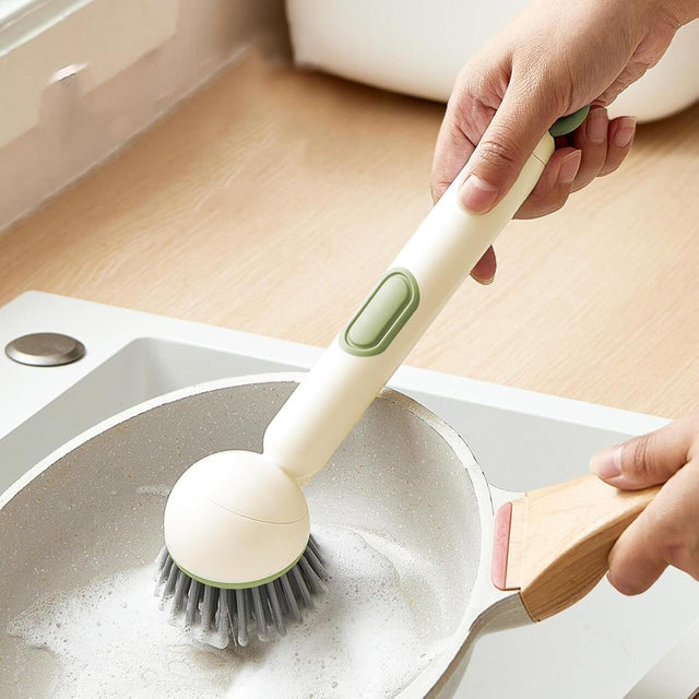 Cepillo multiusos con dispensador de jabón