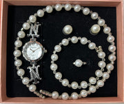 Conjunto de joyas plateado con perlas