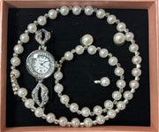 Conjunto de joyas plateado con perlas