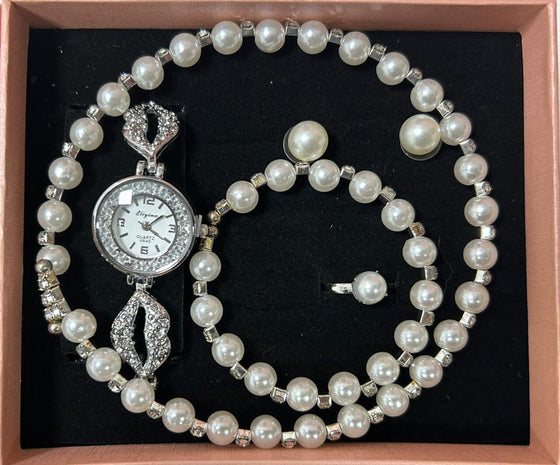 Conjunto de joyas plateado con perlas