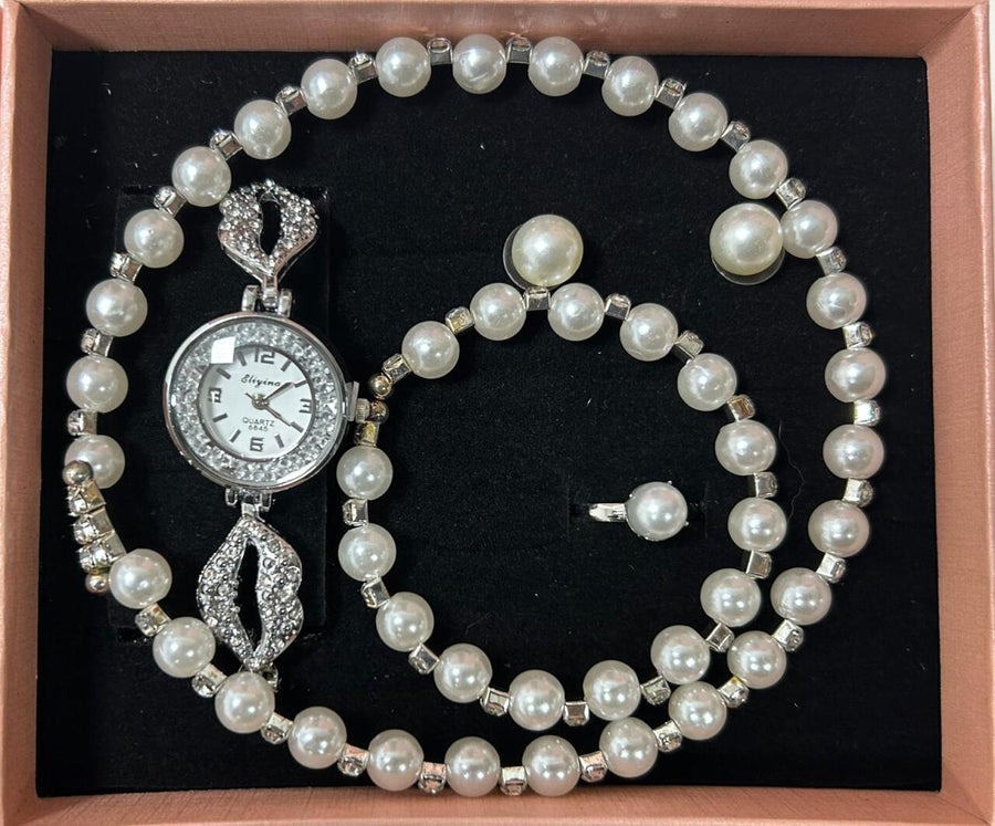 Conjunto de joyas plateado con perlas