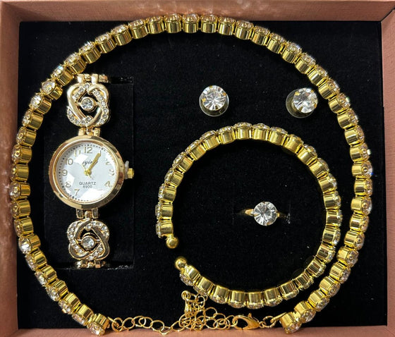 Conjunto de joyas dorado con reloj