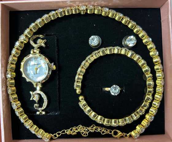 Conjunto de joyas dorado con reloj