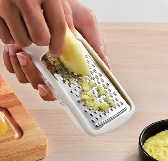 Rallador con depósito para cocina limpia
